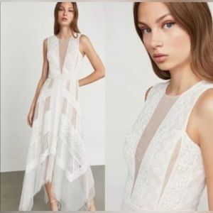 BCBG maxazria white asymmetrical lace dress. Size 2